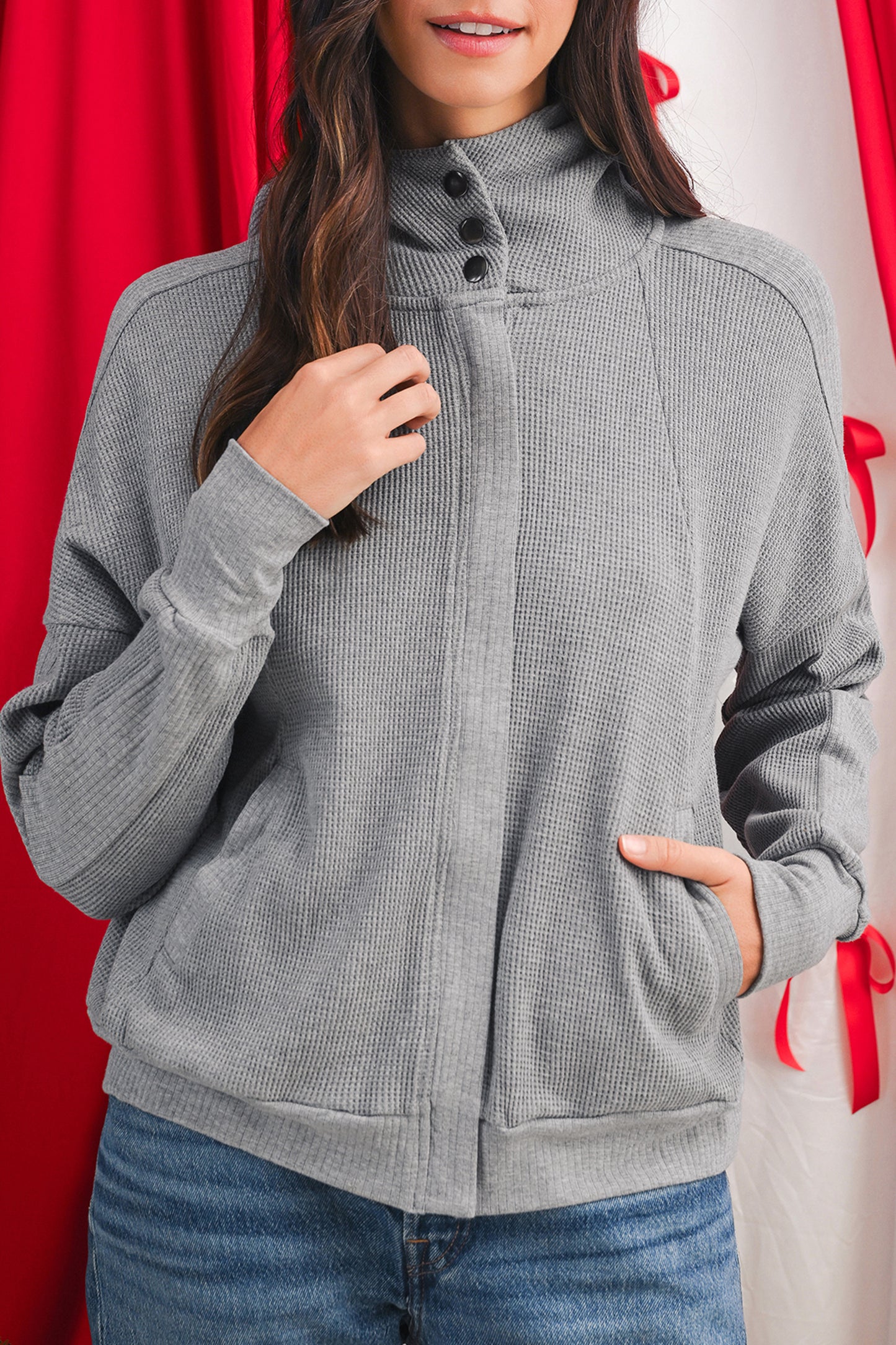 Grijze wafelstructuur jas met rits en capuchon