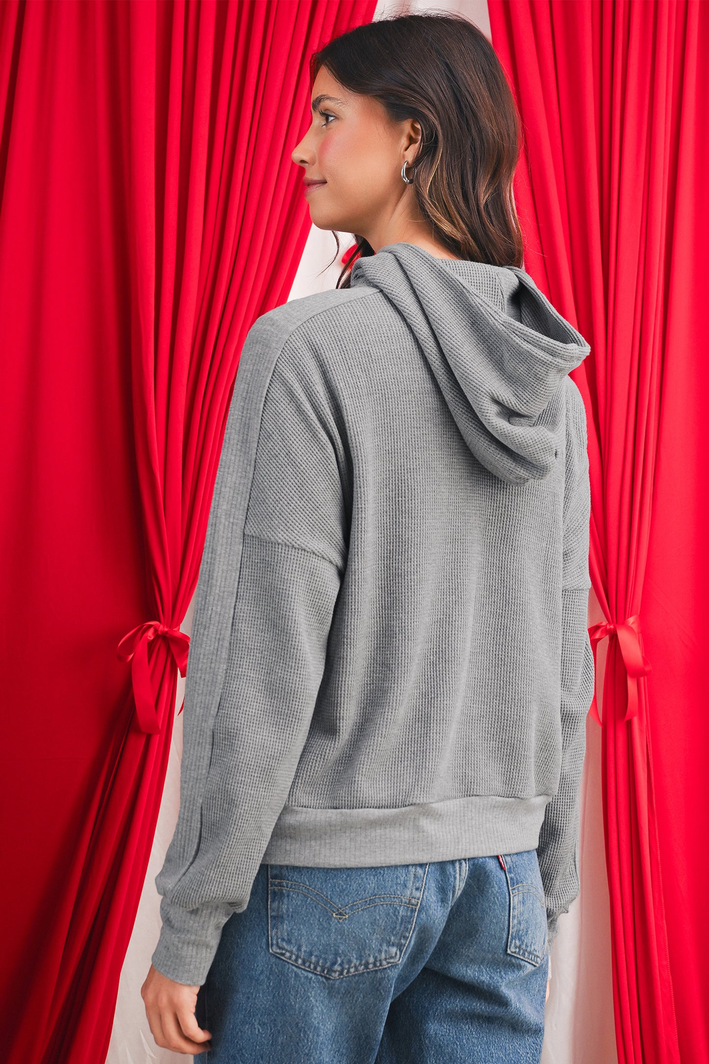 Grijze wafelstructuur jas met rits en capuchon